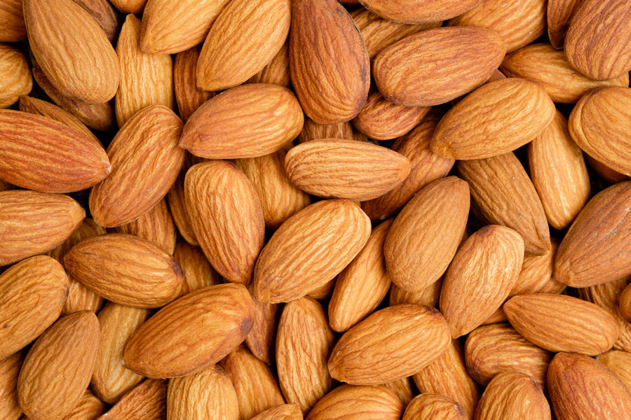 Watch as the CentriFeeder VIB Measures and Controls the flow rate of Almonds